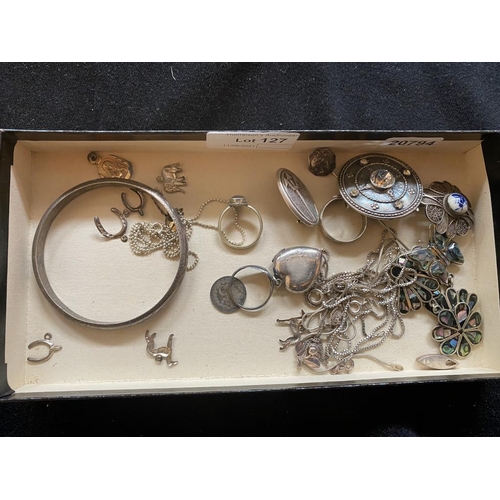 127 - Collection of silver jewellery inc. earrings, neck chains, heart locket, brooches, charms etc