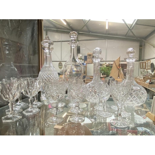 238 - 4 Glass decanters inc. Waterford plus crystal glasses