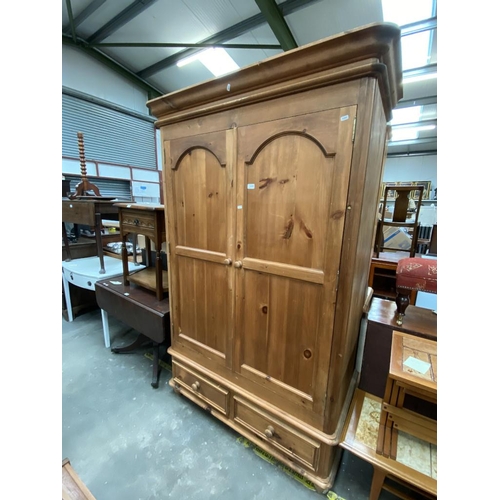 545 - Pine double wardrobe with drawers to base (202H 115W 60D cm)