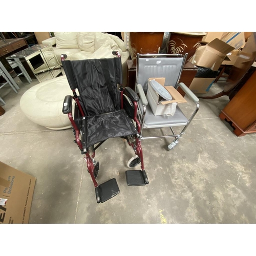 605 - Folding wheelchair & a commode