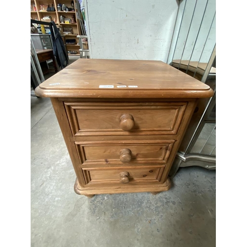 633 - Pine bedside chest 64H 50W 49D