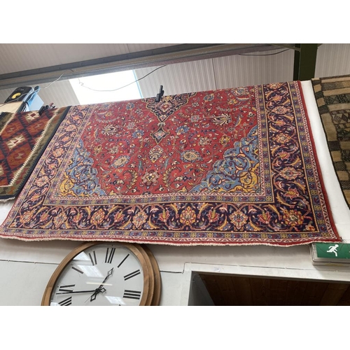 646 - Persian rug (slightly worn in places) 210x310cm