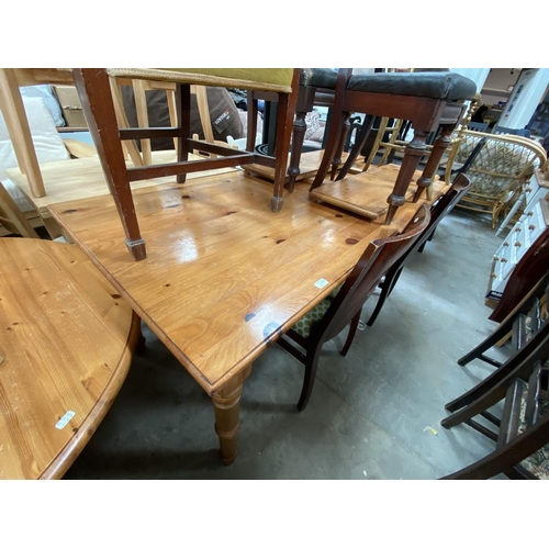 656 - Pine dining table with 2 leaves (978H 182W 90D)