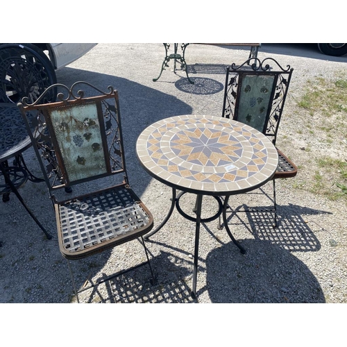 675 - Tile top garden table (71H 60D) and 2 chairs