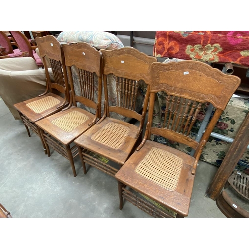 681 - Four oak dining chairs