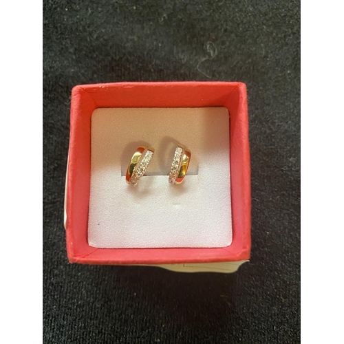 96 - 9ct Gold cz earrings