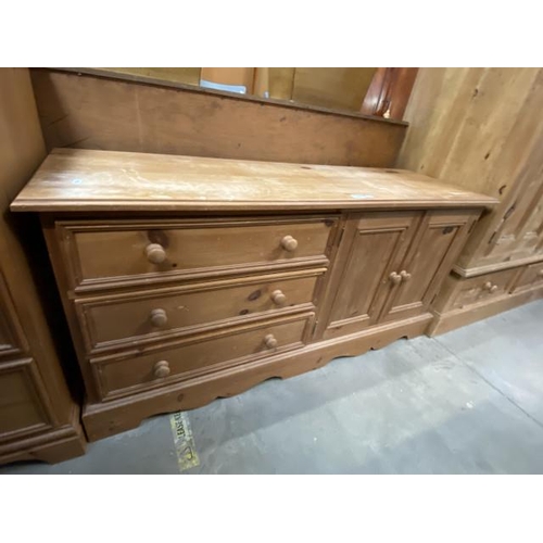 69 - Pine 3 drawer/2 door cupboard (64H 133W 42D cm)