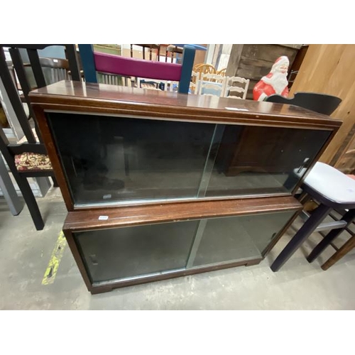82 - Oak glazed bookcase (81H 89W 23D cm)