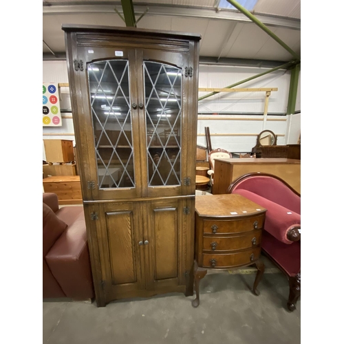 104 - James Lupton & Sons Limited oak corner cabinet (170H 69W 37D cm)