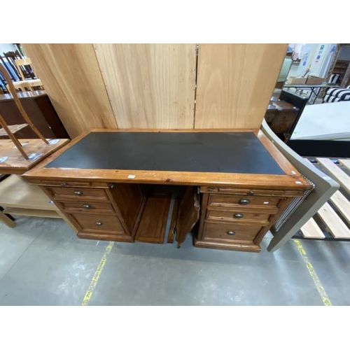 115 - Barker & Stonehouse oak leather topped writing desk (83H 174W 79D cm)