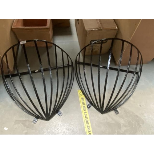 366 - Pair of wrought iron hayracks (approx. 62W 46H cm each)