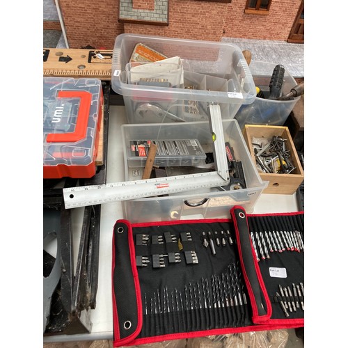 396 - Large quantity of workshop tools inc. Black & Decker work mate, drill bit sets, screws, wood chisel ... 