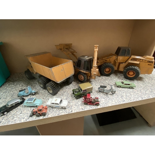 323 - 3 Ertl toys (dumper truck & 2 diggers), Britain's Land Rover, Corgi Lotus Cortina etc