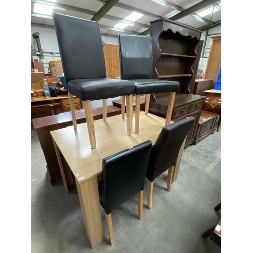 388 - Oak effect dining table (75H 117W 77D cm) & 2 pairs of dining chairs