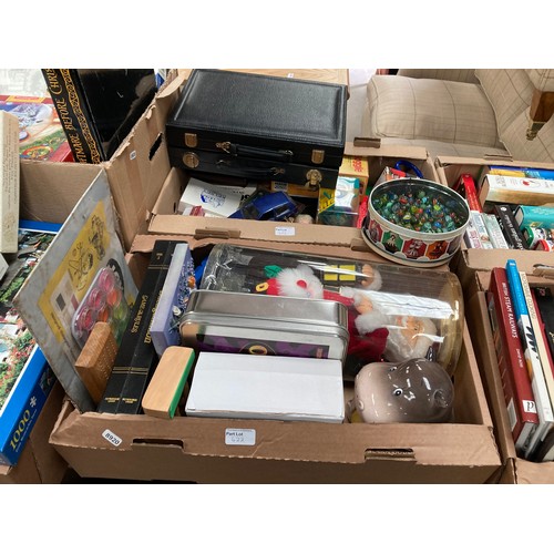 422 - Large quantity of board games, table lamps, home filing system, microwave, tin of marbles, books, tr... 