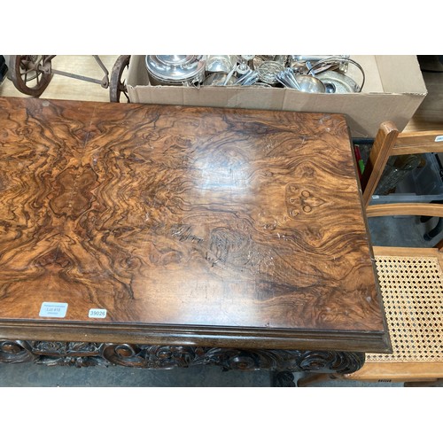 415 - Burr walnut carved console table on paw feet (80H 108W 47D cm) (some veneer as found)