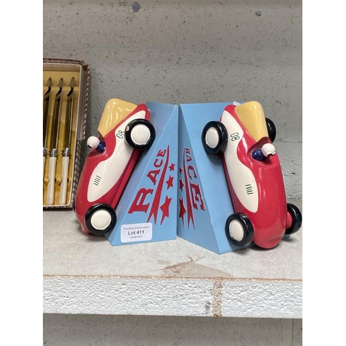 411 - Pair of racing car bookends