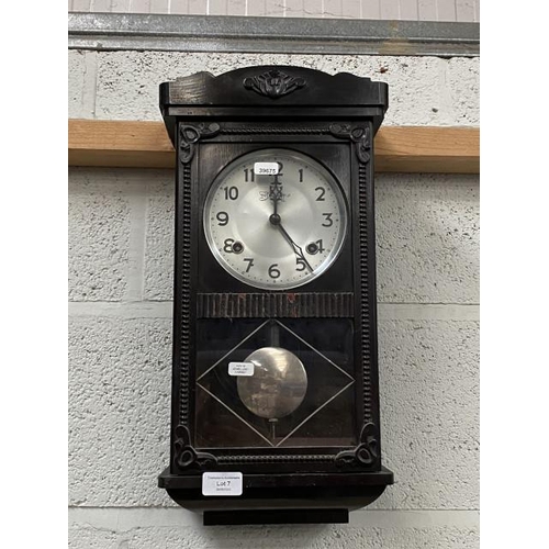 7 - Shroffs wall clock with pendulum (Key in jewellery cabinet)