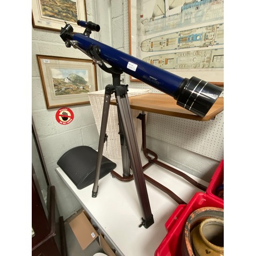 438 - Tasco Galaxsee telescope on tripod (tripod sold as seen), wicker corner laundry basket, 4 boxes cont... 