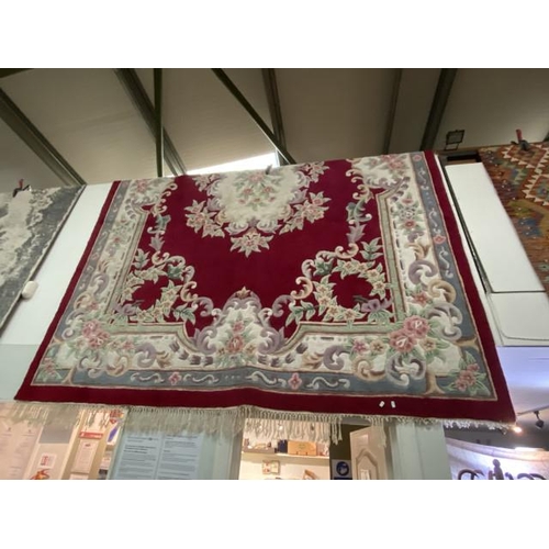 209 - Burgundy ground Chinese style rug 360 x 270cm