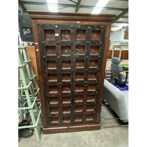 70 - Middle Eastern 2 door cupboard with shelves to the interior (182H 104W 50D cm)