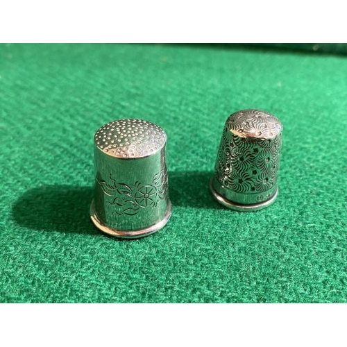 366 - 2 Solid silver thimbles