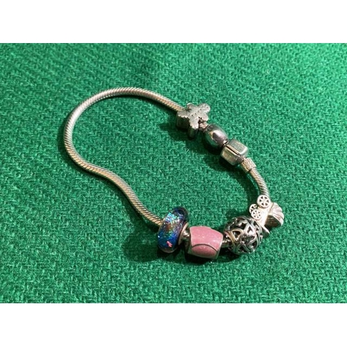 390 - Silver charm bracelet