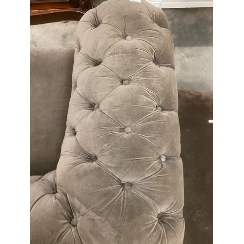 206 - Upholstered antique button back Chesterfield settee (197W cm) & footstool (30H 86W 105D cm)