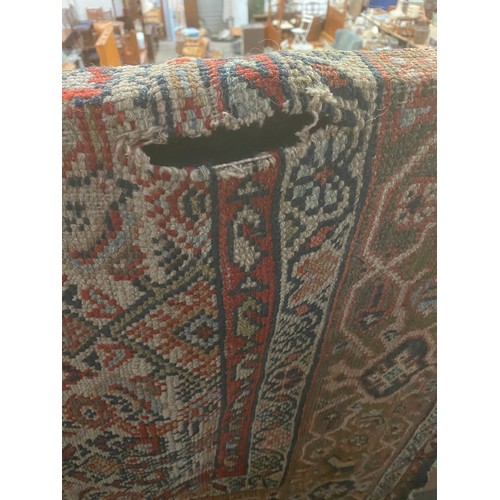 144 - Persian rug 260 x 305cm (As found- approx. 20cm tear/rip)