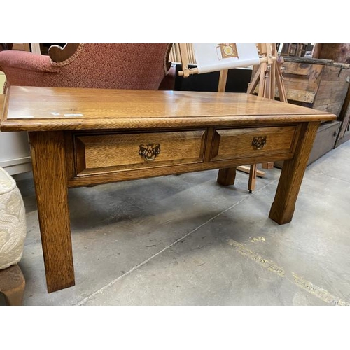 102 - Good quality oak coffee table (50H 107W 53D cm)