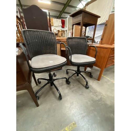 140 - Pair of swivel wicker office chairs