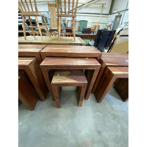 153 - Continental nest of 3 hardwood tables (75H 75W 34D cm)