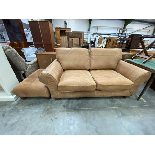 180 - Tan leather 2 seater settee (180W cm) & matching footstool (35H 94W 60D cm)
