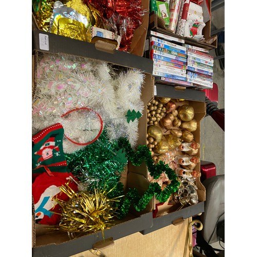 473 - 9 Boxes of assorted Christmas decorations, Christmas wrapping paper, assorted Christmas CDs, 2 7' wo... 