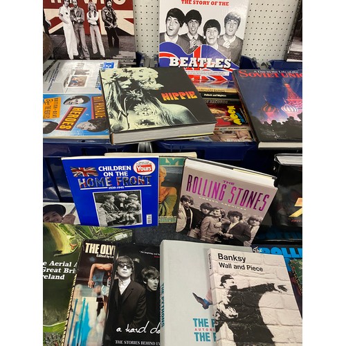 384 - Large collection of mainly music & sporting books inc. 50 Years of Playboy, The Rolling Stones, 40 Y... 