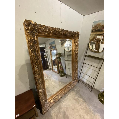 145 - Heavily carved gilt dressing mirror (183x140cm)