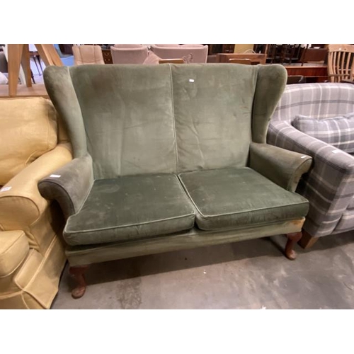 Green upholstered wing back settee 133w