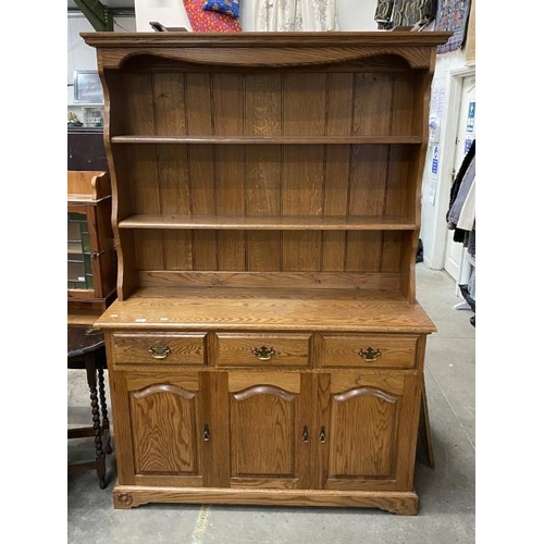 181 - Yorkshire oak dresser with Yorkshire Rose carved motif (190H 130W 46D cm)