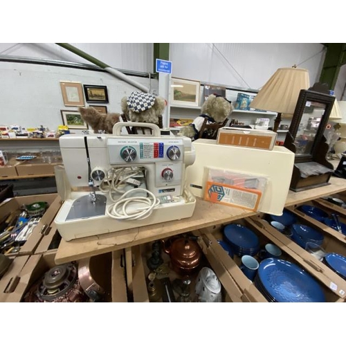 477 - New Home 691 sewing machine with foot pedal & accessories