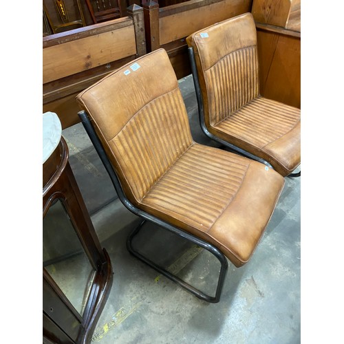 114 - Pair of contemporary tan leather chairs (50W cm)