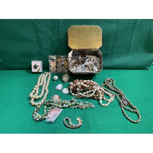 320 - Tin of costume jewellery including vintage, coins, cameo scarf clip, bar brooch etc.