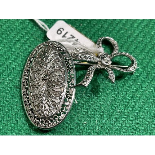 337 - 2 Silver & marcasite vintage brooches. One stamped silver, the other 800