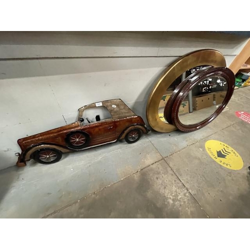 514 - 2 oval mirrors 93 x 70cm & 85 x 60cm and a tin plate car