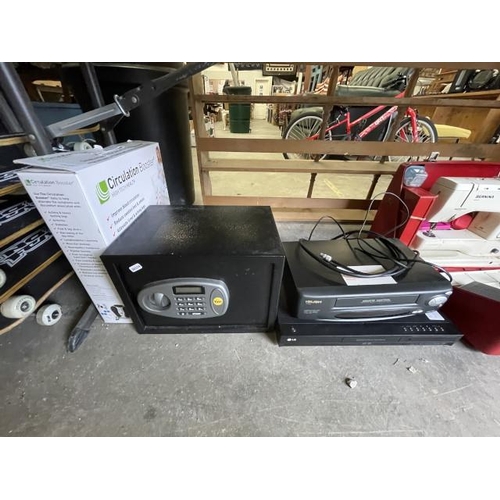 545 - Circulation booster, Yale safe (no key - locked), LG DVD player (no remote) etc