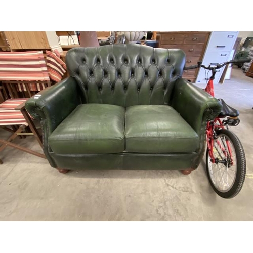 601 - Green leather button back Thomas Lloyd 2 seater settee (130W cm)