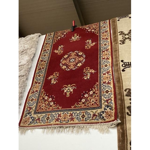 83 - Persian style red ground rug 150 x 93cm