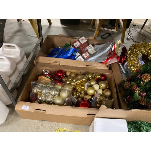 551 - 4 Boxes of assorted Christmas decorations etc