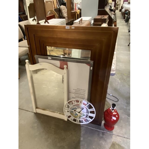 82 - Red table lamp, white circular clock, gilt framed mirror 118 x 92cm and a picture frame 87 x 67cm