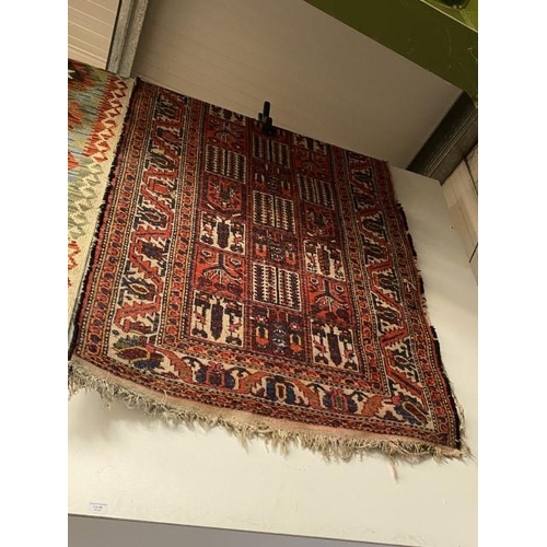 86 - Persian red ground rug 160 x 108cm