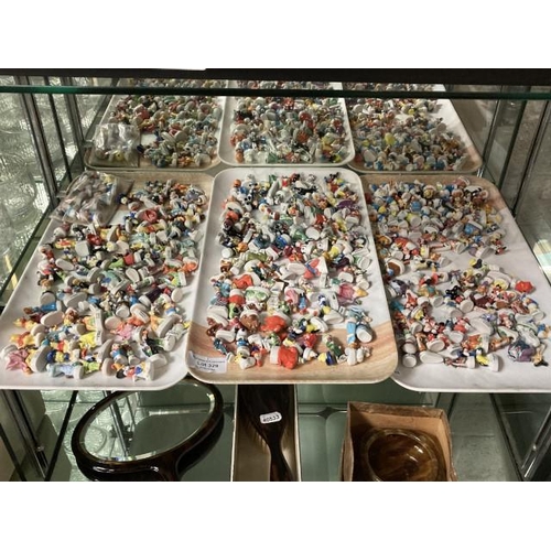 329 - Approximately 300 miniature porcelain Disney figurines including sets & part sets, Donald Duck, Mick... 